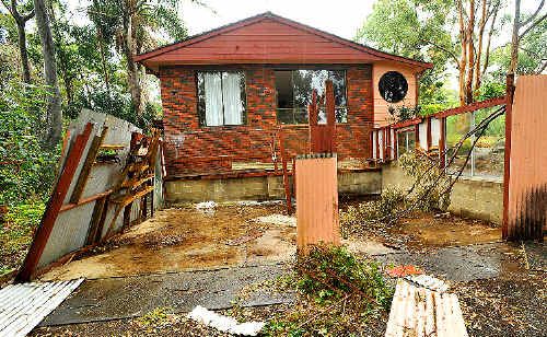 This house on Bark Hut Road had its garage stolen. This house on Bark Hut Road had its garage stolen.